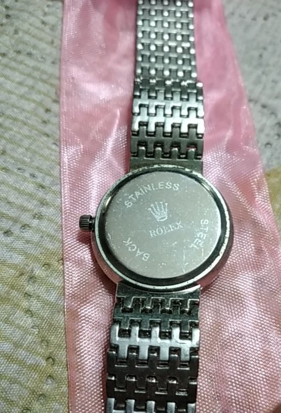 Relógio com bracelete cor de prata