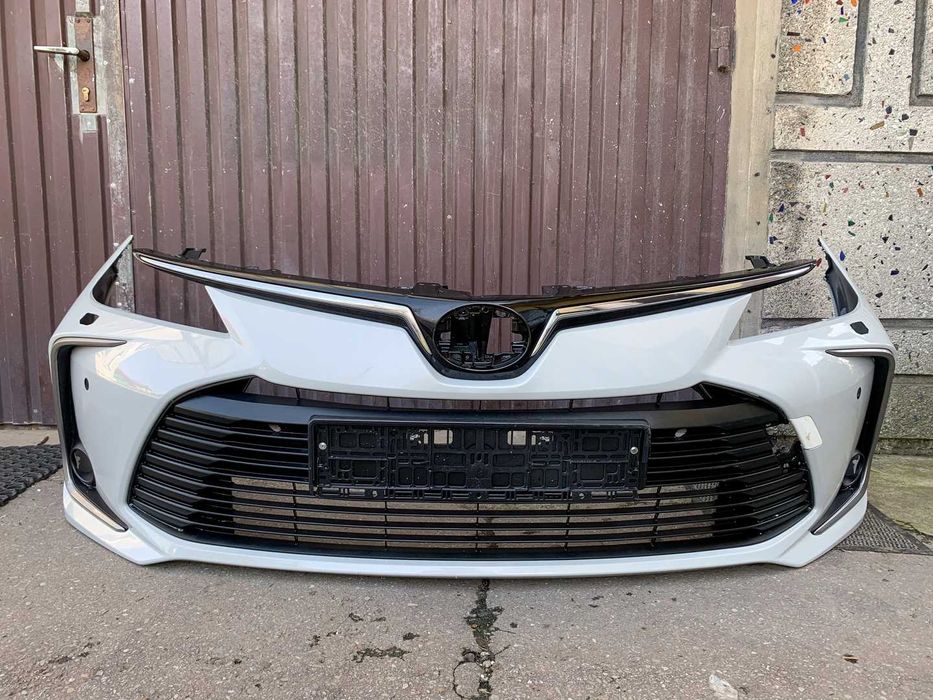 TOYOTA COROLLA E21  бампер передний