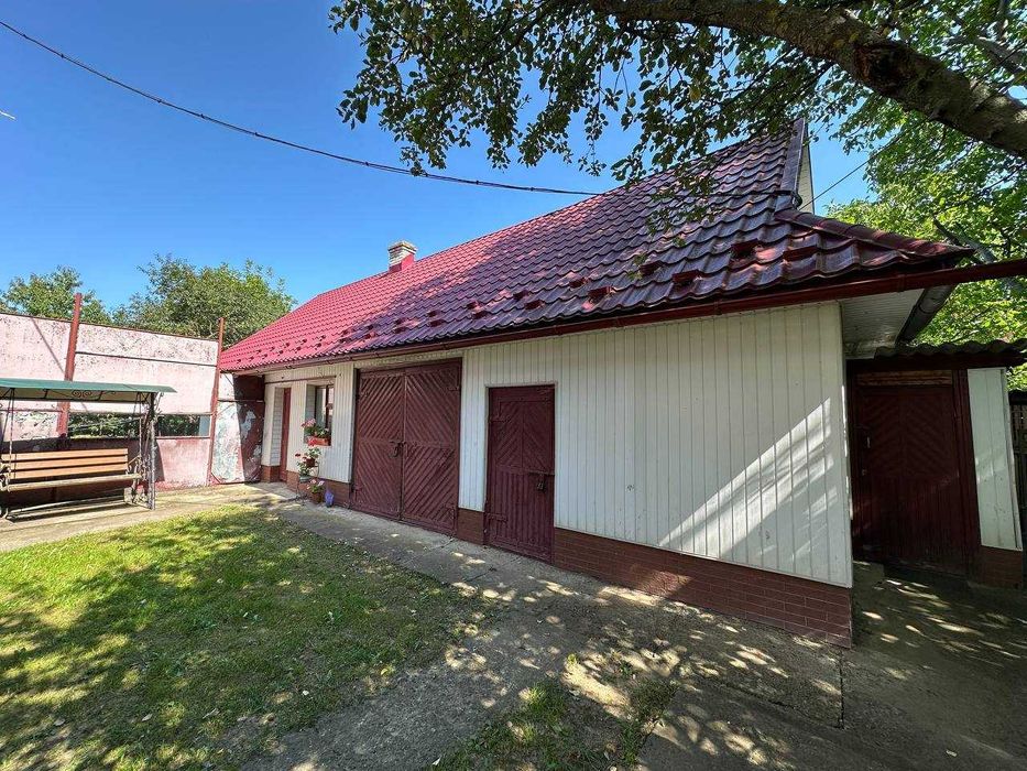 Продаж 2 пов будинку з 2 гаражеми і ділянкою на 12 соток, 236.5 кв.