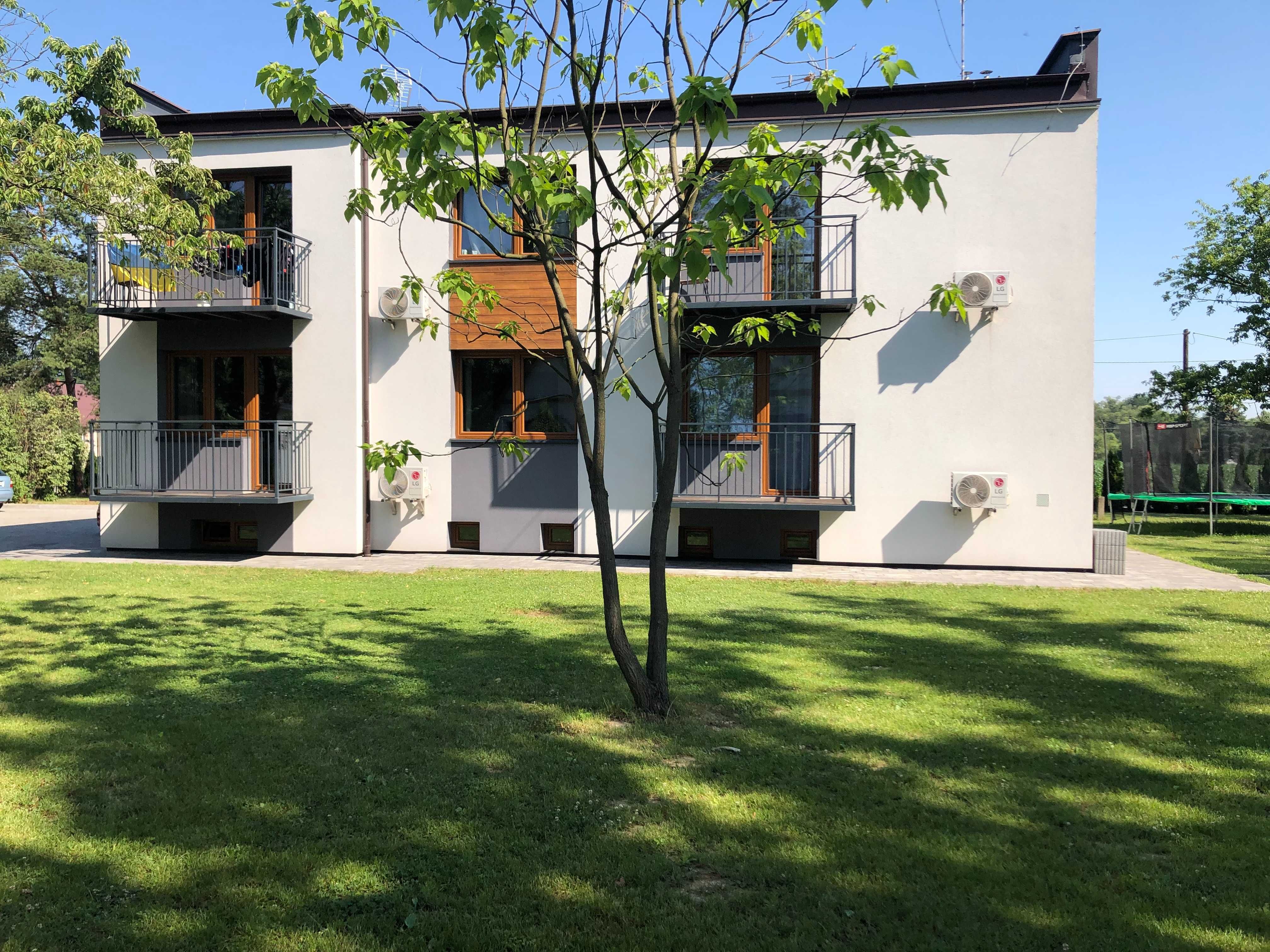 nocleg Zator Energylandia apartament pokoje nad łowiskiem nad wodą