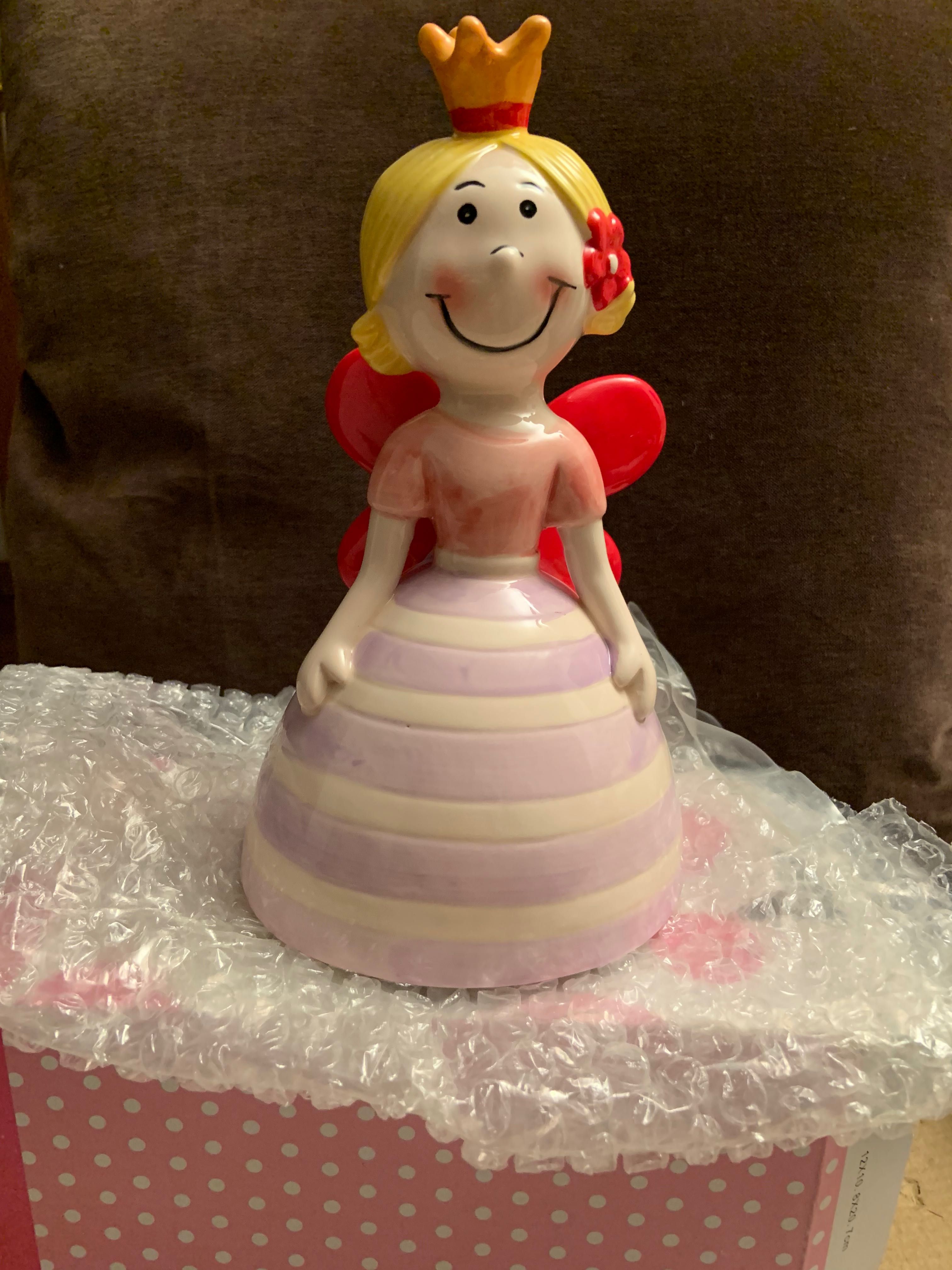 Boneca (mealheiro) em loiça pintada