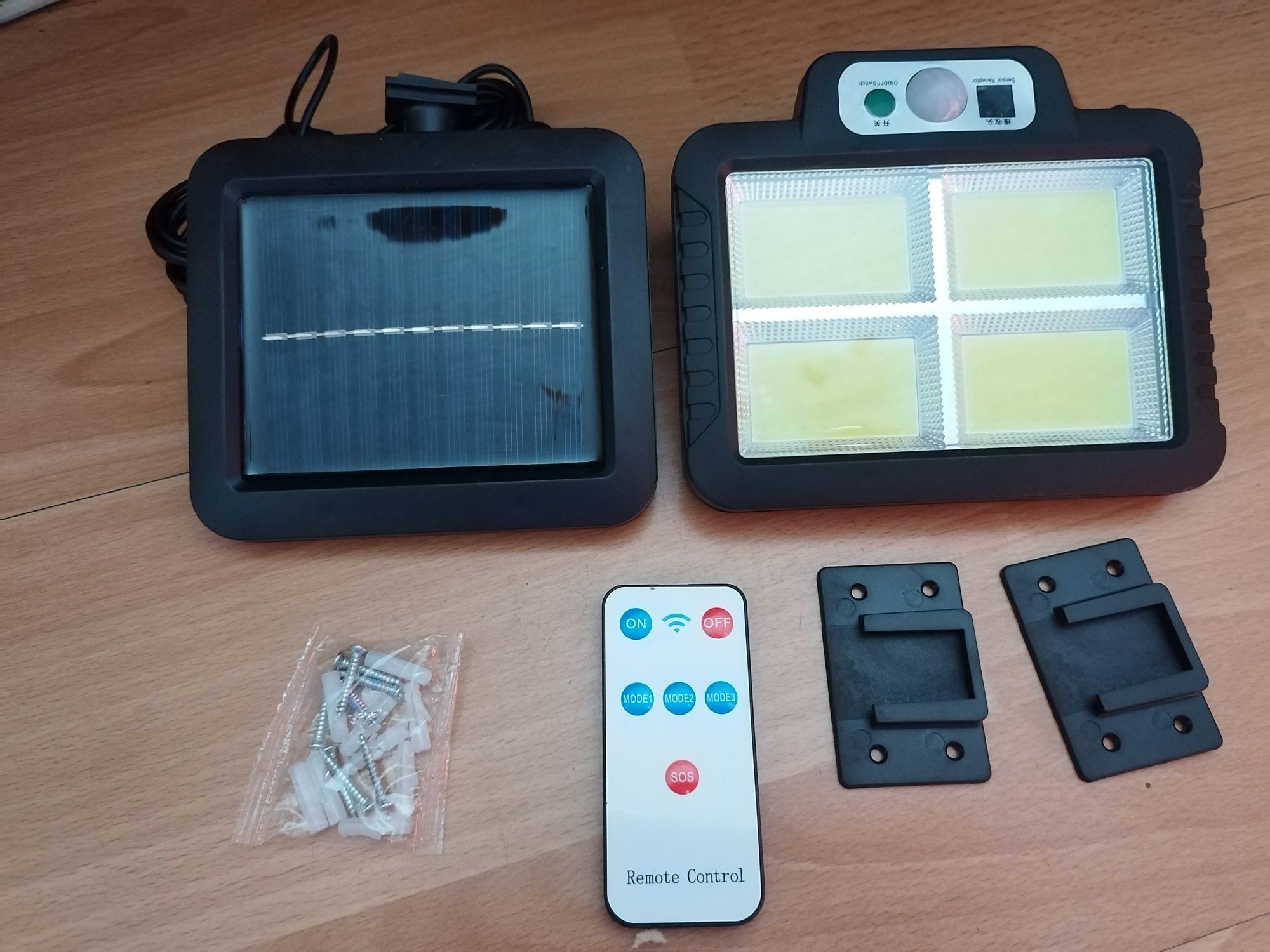 Lampa solarna zewnetrzna na ogród taras garaż solar czujnik ruchu led