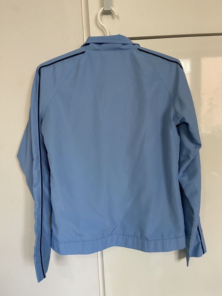 Niebieska baby blue kurtka wiatrówka Reebok