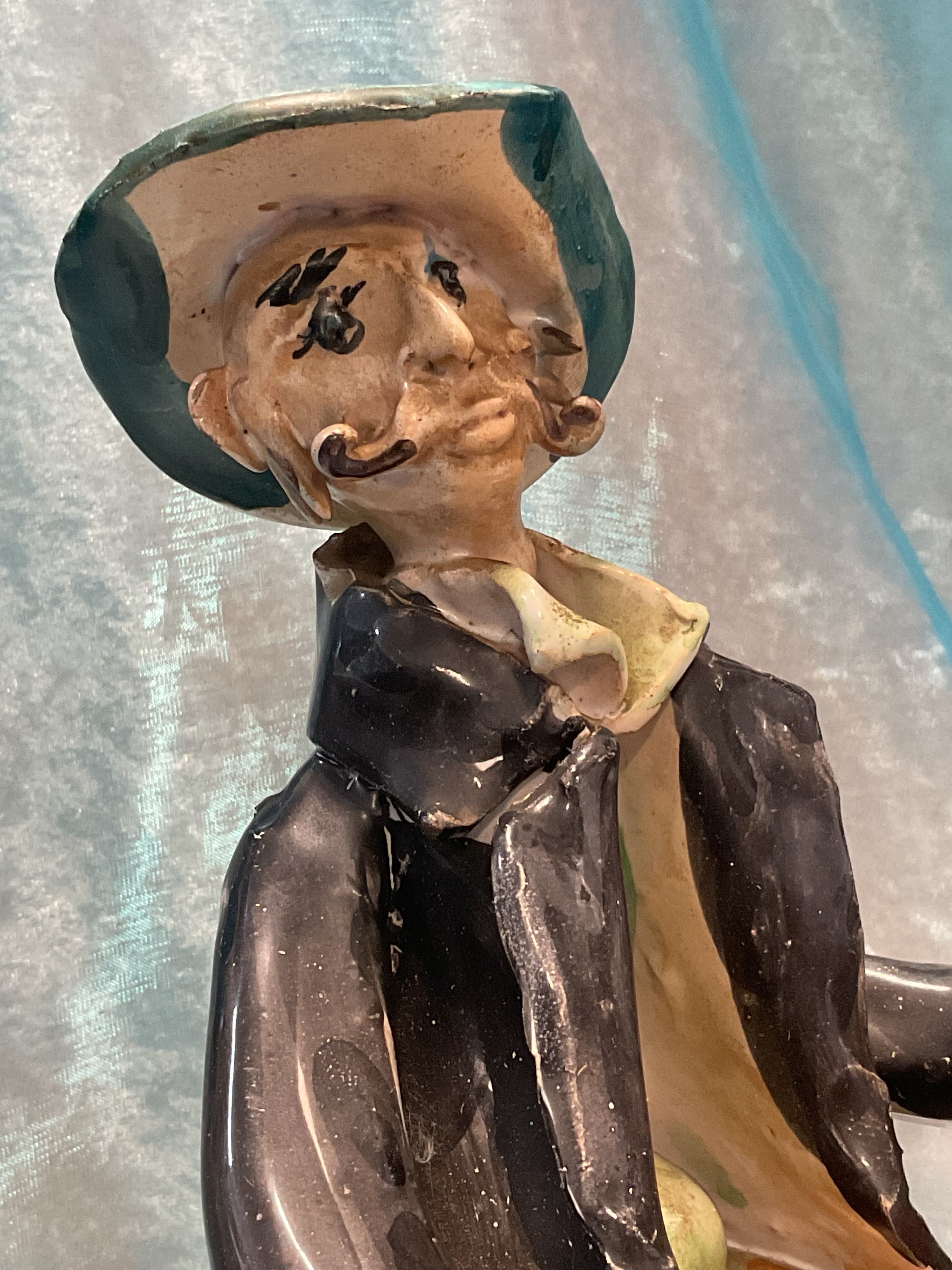 Escultura faiança 23x25 cm
