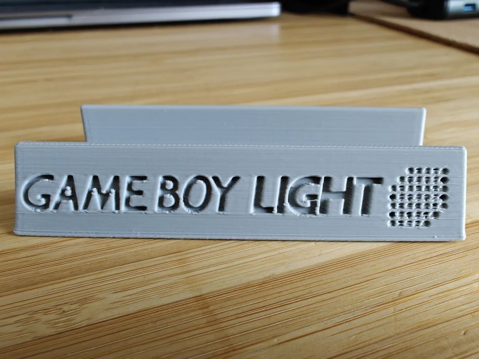 Suporte "Nintendo Game Boy Light"