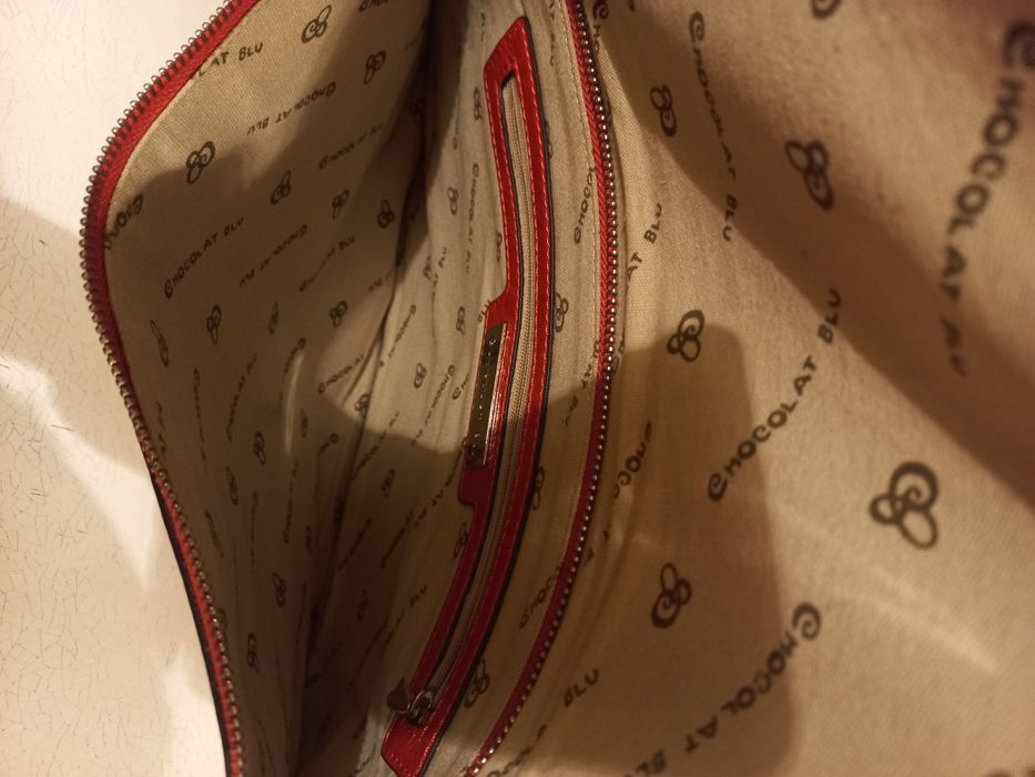 Кожаный клатч в очень хорошем состоянии