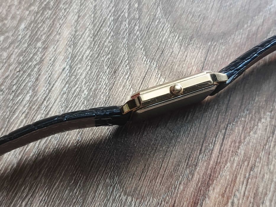 Sprzedam złocony męski zegarek garniturowy Deloitte & Touche