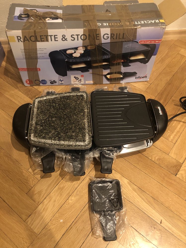 Grill elektryczny „Raclette & Stone”. Duzo pojemników, szybko grzeje.