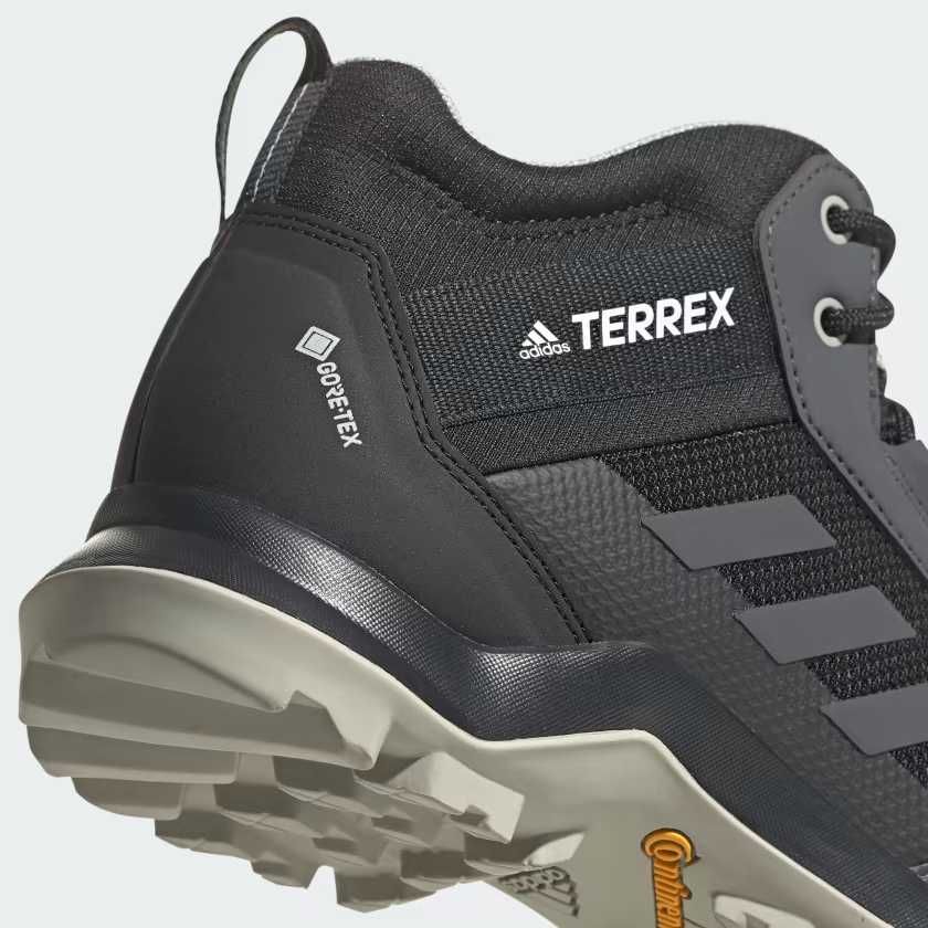Жіночі трекінгові кросівки Adidas Terrex AX3 Mid. 40.7 EU (25 см)
