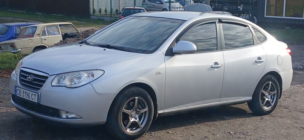 Hyundai Elantra 1.6 Газ/Бенз. АКПП