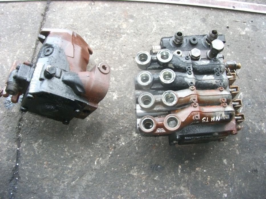 New Holland TS115A--pompa hydrauliczna,rozdzielacz,sekcja--częścI