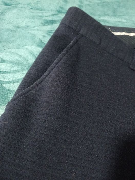 Calças azuis escuras