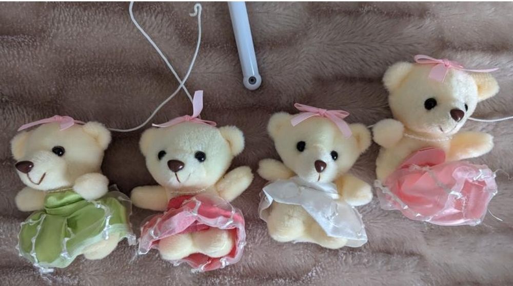 Карусель на ліжечко музична заводна з 4 плюшевими підвісками