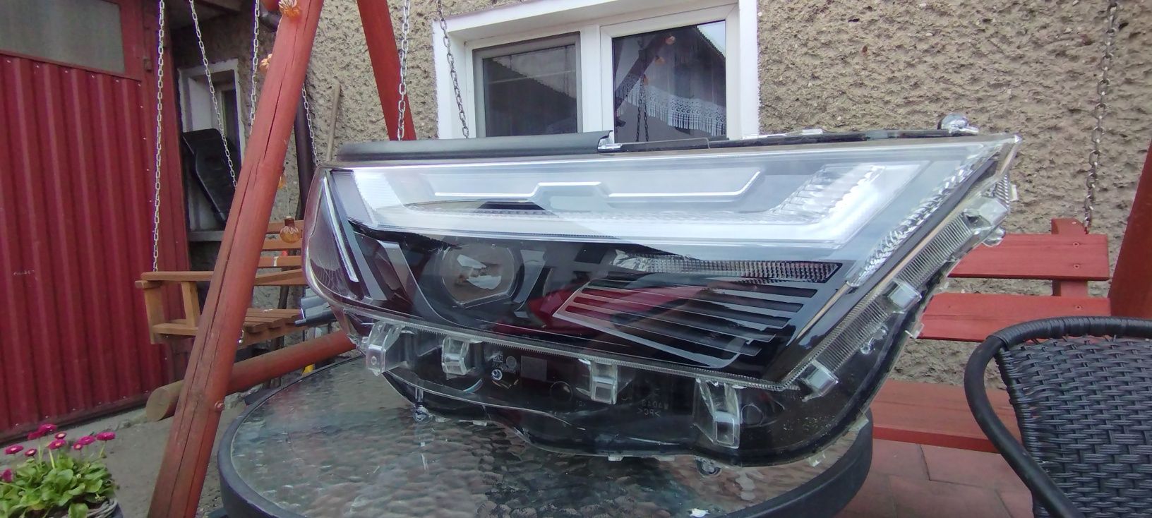 Reflektor Toyota RAV4 lift.