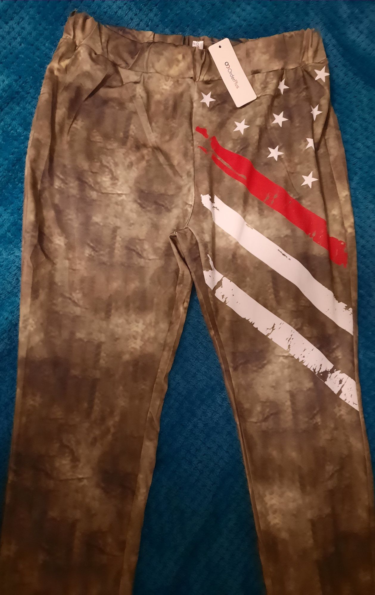 Nowe legginsy w kolorze khaki XK/XXL