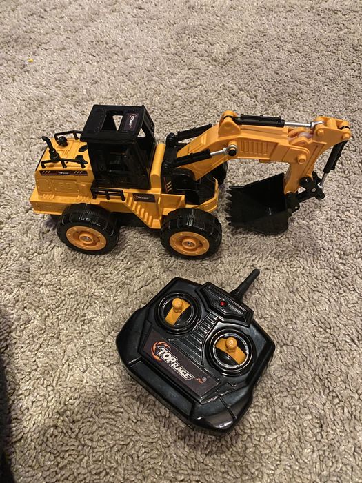 Escavadora telecomandada eletrica