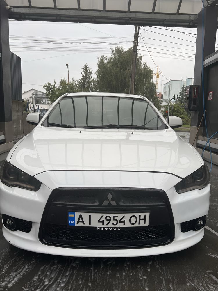 Mitsubishi Lancer 2012 • 1.6 МКПП ГАЗ/БЕНЗИН