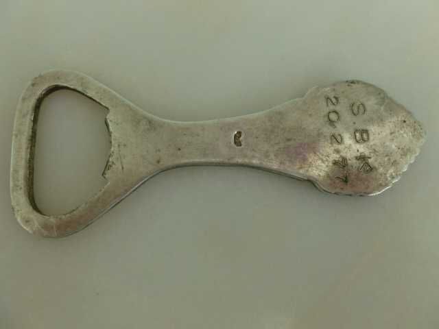 Abre capsulas em prata