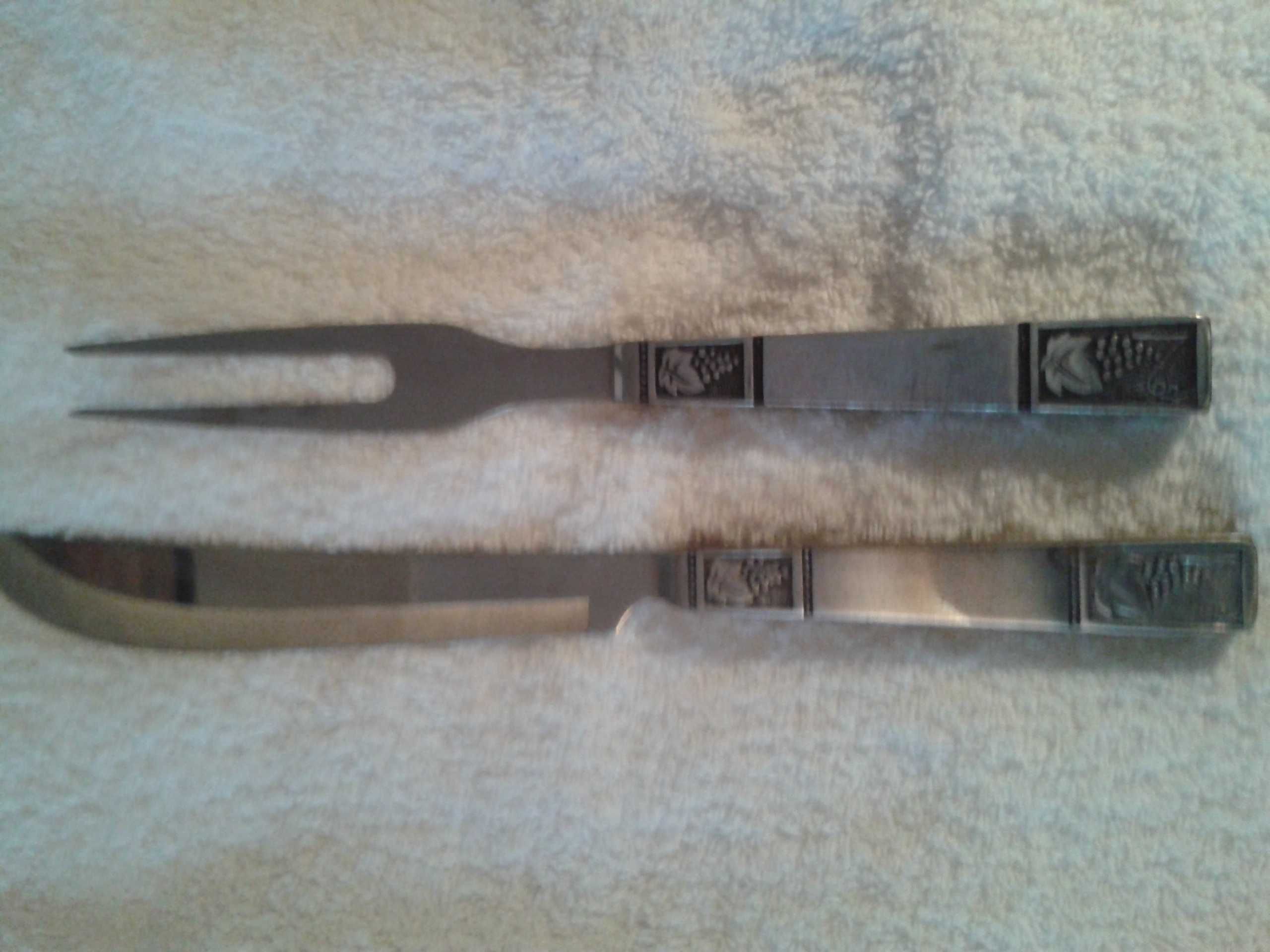 2 talheres trinchantes