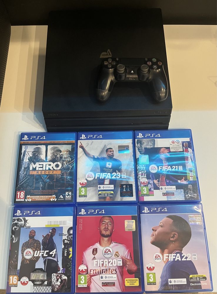 PS4 PRO 1 TB + pad + 6 gier