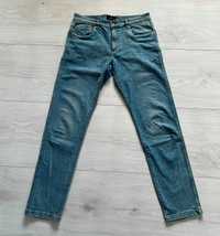 Spodnie jeans Reserved 33/34