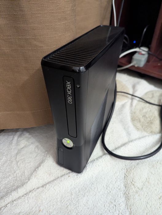 Xbox 360 slim читайте опис