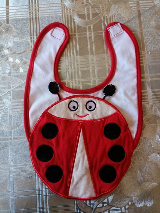 Слюнявчик "сонечко"