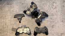 2 sprawne pady Dualshock 3, stacja ładowania, klawiatura + 2 na czesci