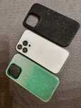 iPhone 14 Pro i dwa etui Svarowski