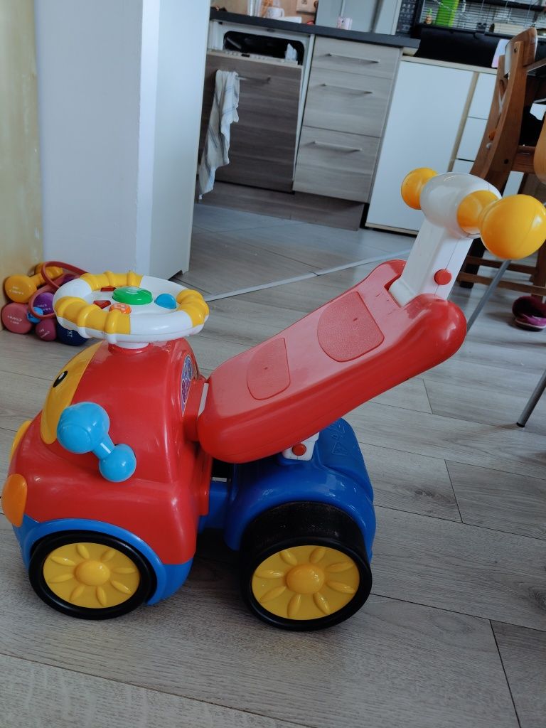 Jeździk auto smily z armatą na kołki strzela gra muzyka interaktywne