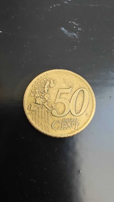 Moeda grega de 50c com F na estrela