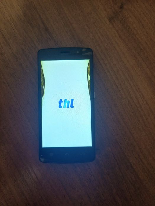 Телефон thl 4000
