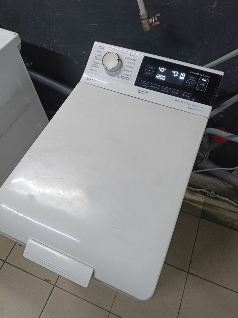 Вертикальна пральна/стиральная машина Electrolux PerfectCare 700
