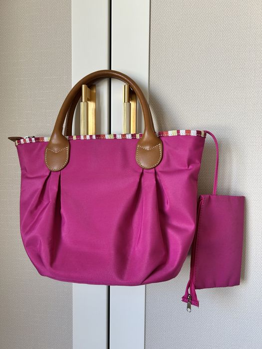 Mala de mão fúcsia