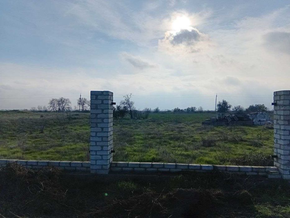 Продам участок в Беляевке 100м. от реки .