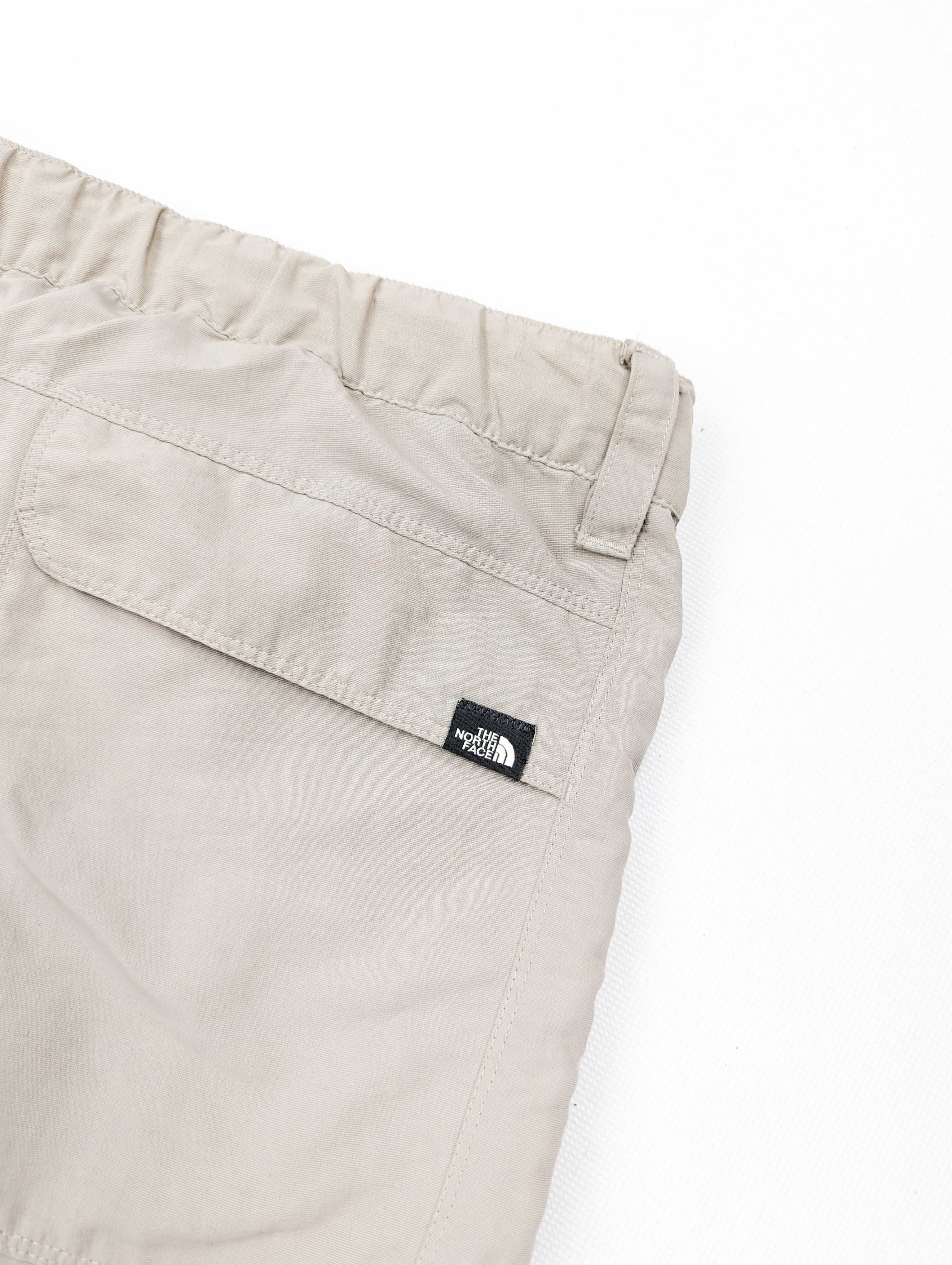 The North Face beżowe spodnie spodenki 2in1 XL logo
