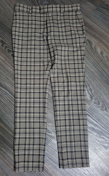 Стильні чоловічі  брюки в клітинку