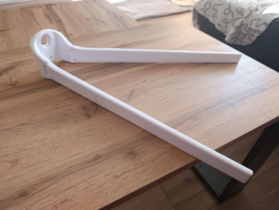 Podwójny ruchomy wieszak ścienny na ręczniki