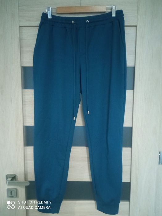 Mohito damskie spodnie joggersy dresowe 42