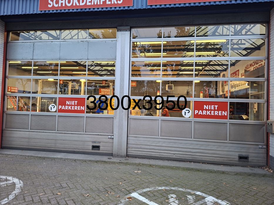 Brama segmentowa 380 x395 przeszklona ; naped; transport; montaz