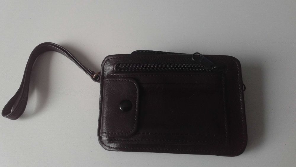 Mała skórzana torebka na dokumenty - męska saszetka