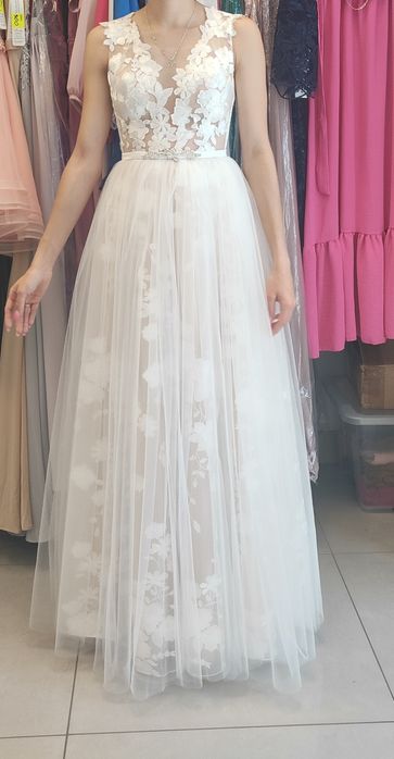 Śmietankowa suknia ślubna