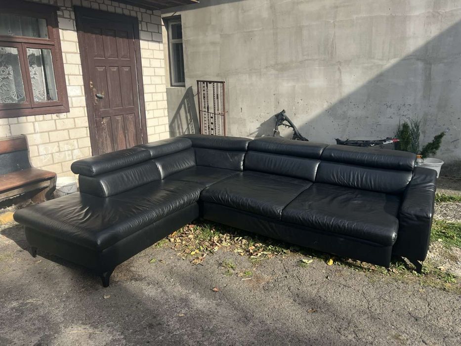 Кожаний диван стан нового