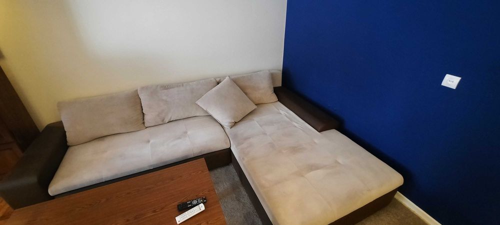 Narożnik z funkcją spania beżowy brązowy 300/215