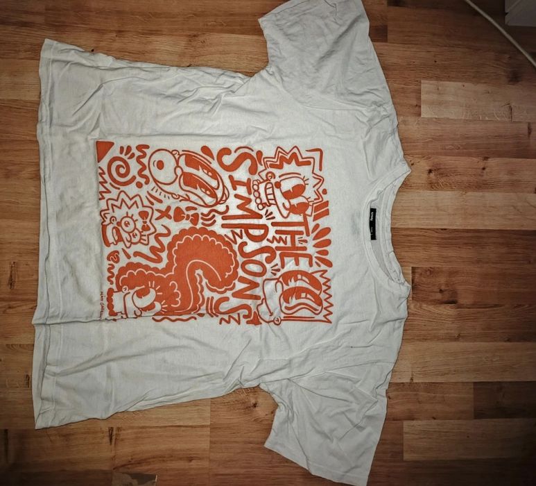 Damska biała koszulka z nadrukiem w rozmiarze L