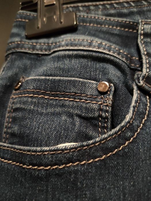 Elastyczne jeansy r.40