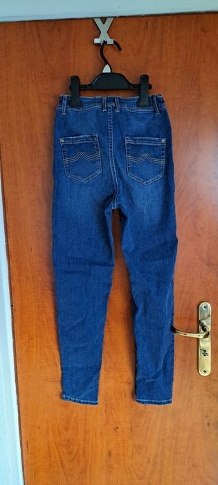 Spodnie jeansowe 152 stan idealny