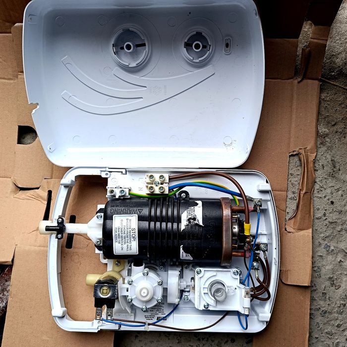 Prysznic elektryczny Triton