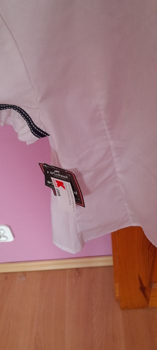Nowa z metką biała bluzka 134