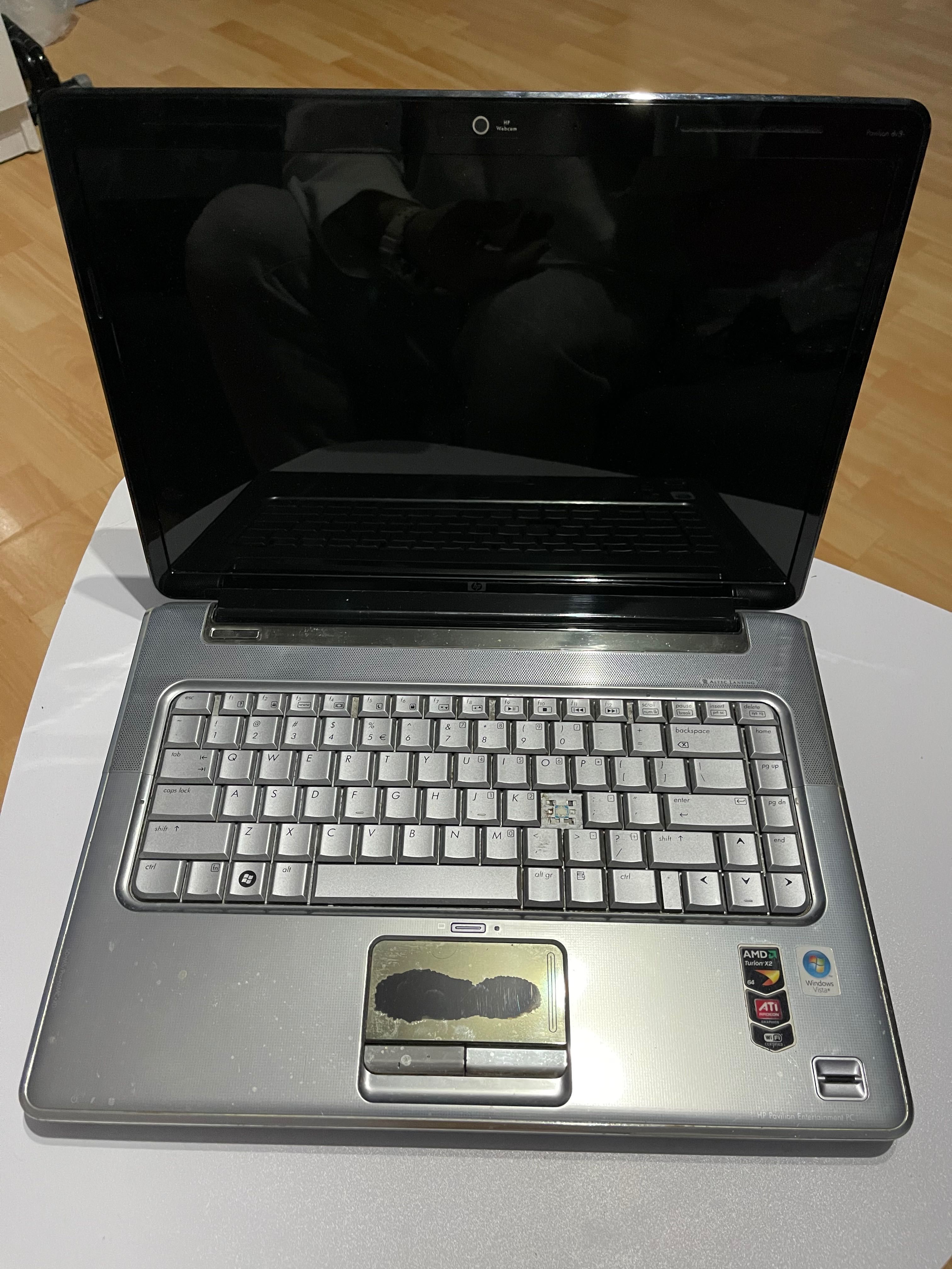 Uszkodzony laptop (taśma) HP Pavilion na części + oryginalna ładowara